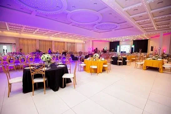 A banquet-style table layout inside the venue